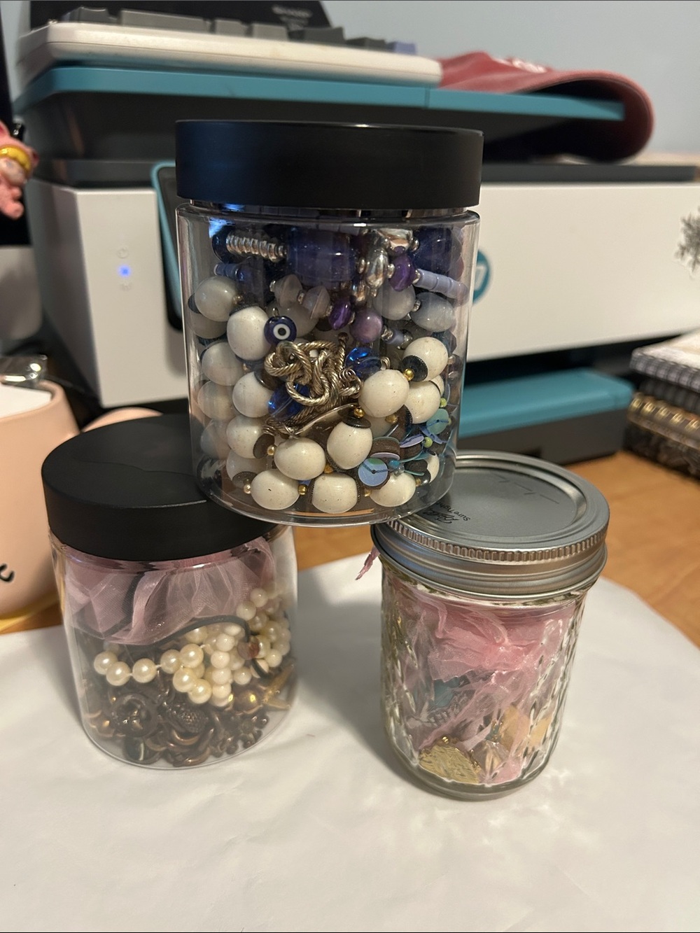 Jewelry jars your choice- blue with black lid, brown/white with black lid.
